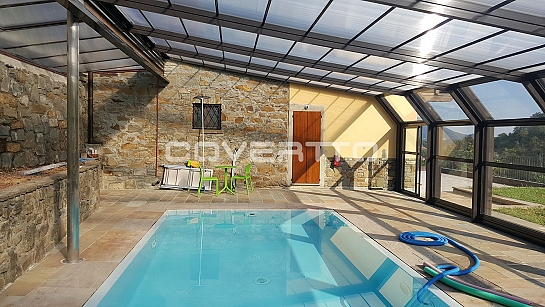 Cubierta de piscina adosada