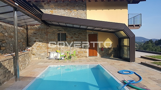 Cubierta de piscina adosada